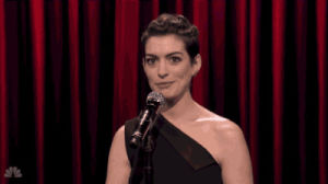 anne hathaway,television,jimmy fallon,smiling,woman,nbc,winking,tonight show starring jimmy fallon,west coast,50 cent better watch out