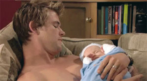 chris hemsworth,shirtless,reactions,baby,dad,father,chris hemsworth holding baby