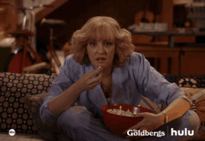 popcorn,excited,eating popcorn,captivated,the goldbergs,tv,movies,hulu,enthralled,wendi mcclendon covey