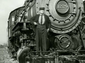 black and white,buster keaton,steam locomotive,my edit,train,smoking,silent film,cigarettes,silent movie,the goat,what a badass,this is one of the loveiest things ive ever seen