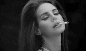 smoking,weed,lana del rey,black and white,smoke,cigarette,smoking cigarette,blowing smoke