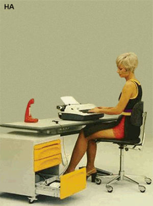 70s,office,typewriter,flexibility,working girl,spring,1970s,slinky,desk