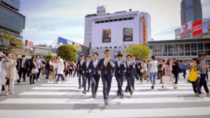 world order,music,shibuya,businessmen,walking,japan,squad,have a nice day,dance group,slow walk