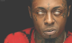 lil wayne,boy,young money,lovey,weezy,hot,black,red,eyes,tattoos,satan,ymcmb,bitches love me,good kush and alcohol,tunnechi