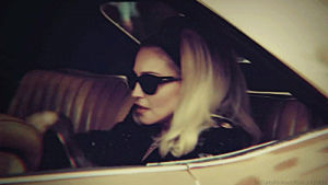 madonna,sunglasses,car,blonde,embarrassed