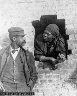 black and white,african american,courtship,love,vintage,3d,couple,romance,window,romeo and juliet,wigglegram,black history,stereogram,vintage3d,vintage 3d,brick wall,african american history,1890s,unaccompanied minors