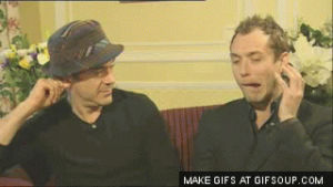 robert downey jr,laughing,smiling,sherlock holmes,funny face,jude law