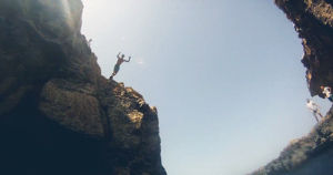cliff jump,diver,diving,swimming,summer,college,swim,vacation,dive