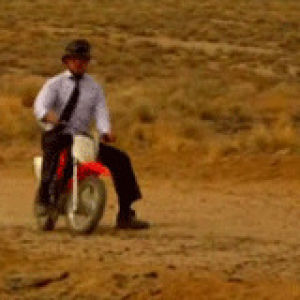 motorbike,awkward,robert downey jr,working,desert