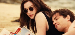couple,anne hathaway,cute,smiling,smiling at each other,at the beach