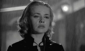 emotional,elevator to the gallows,somber,raining,longing,jeanne moreau,noir,bothered,movies,sad,reactions,woman,upset,walking,grief,moving pictures,im sad