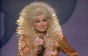 laughter,dolly parton,comedy,laughing,singing,blonde,stand up,sequins,big hair,kissing stranger
