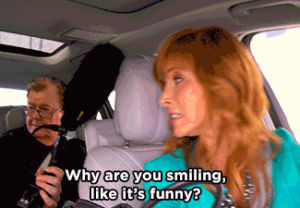 lisa kudrow,tv,funny,smile,hbo,smiling,serious,comeback,the comeback,valerie cherish,val cherish,real show,this is not funny,this is work,why are you smiling,its not funny,this isnt fun time,you cant do this
