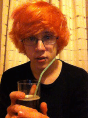 drinking,straw,hair,awkward,smiling,glasses,alcohol