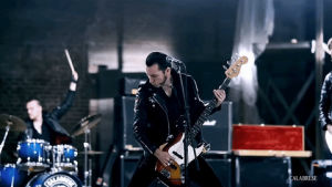 bass guitar,music video,punk rock,warehouse,leather jacket,death rock,calabrese,dark rock,calabrese band,bobby calabrese,jimmy calabrese,davey calabrese,i wanna be a vigilante,rock out,born with a scorpions touch
