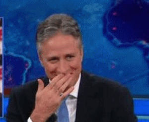 laughing,jon stewart,giggling,the daily show