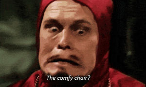 monty python,it sorta makes sense,cause its a chair,and he looks really distressed