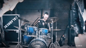 music video,singing,guitar,drums,punk rock,leather jacket,death rock,calabrese,dark rock,calabrese band,bobby calabrese,jimmy calabrese,davey calabrese,bass guitar,i wanna be a vigilante,rock out,born with a scorpions touch