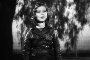 black and white,shirley temple,1934,1930s,film,vintage,old hollywood,classic film,classic hollywood,vintage s,child star,hitchhiker,hitchhiking,bright eyes,aviator