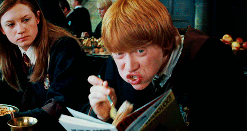 Ron studying but also eating