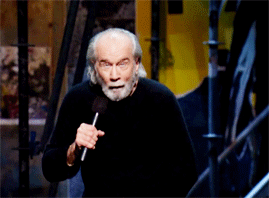 George Carlin passionately delivering his 7 words routine on stage